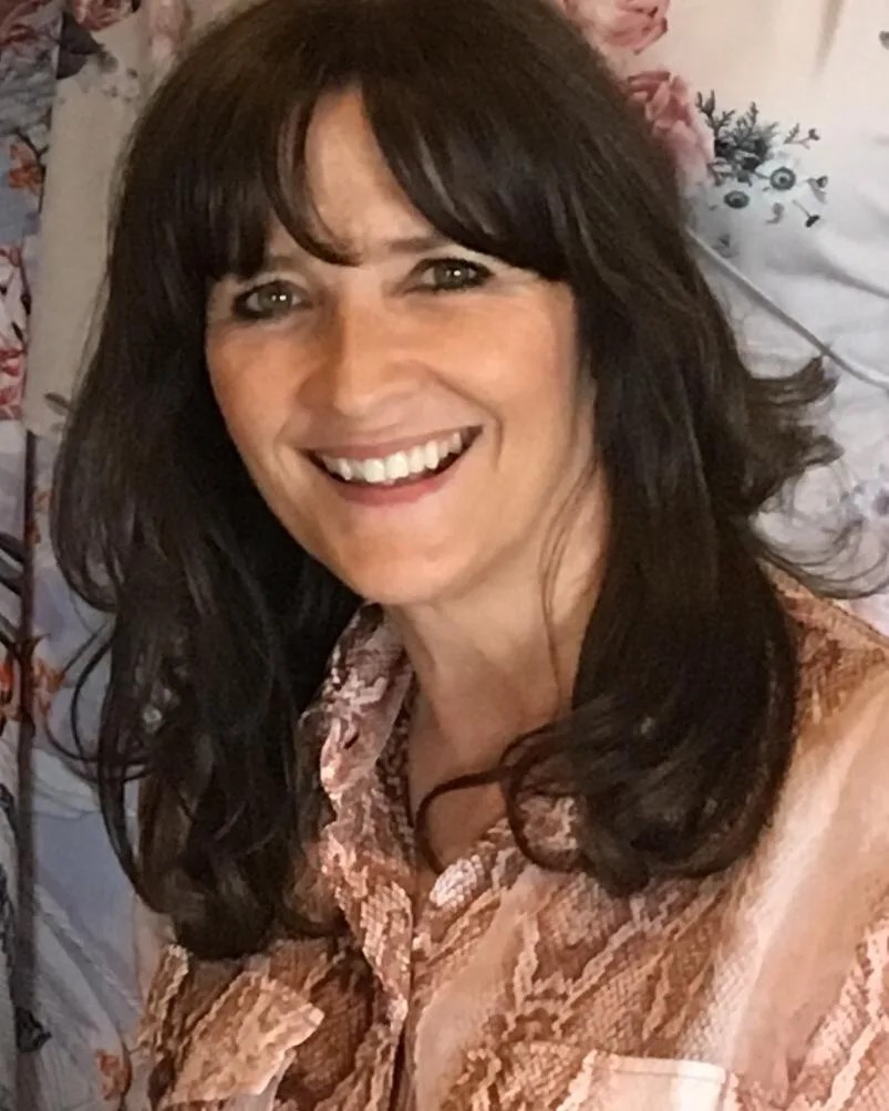 Laura Ashurst smiling into the camera.